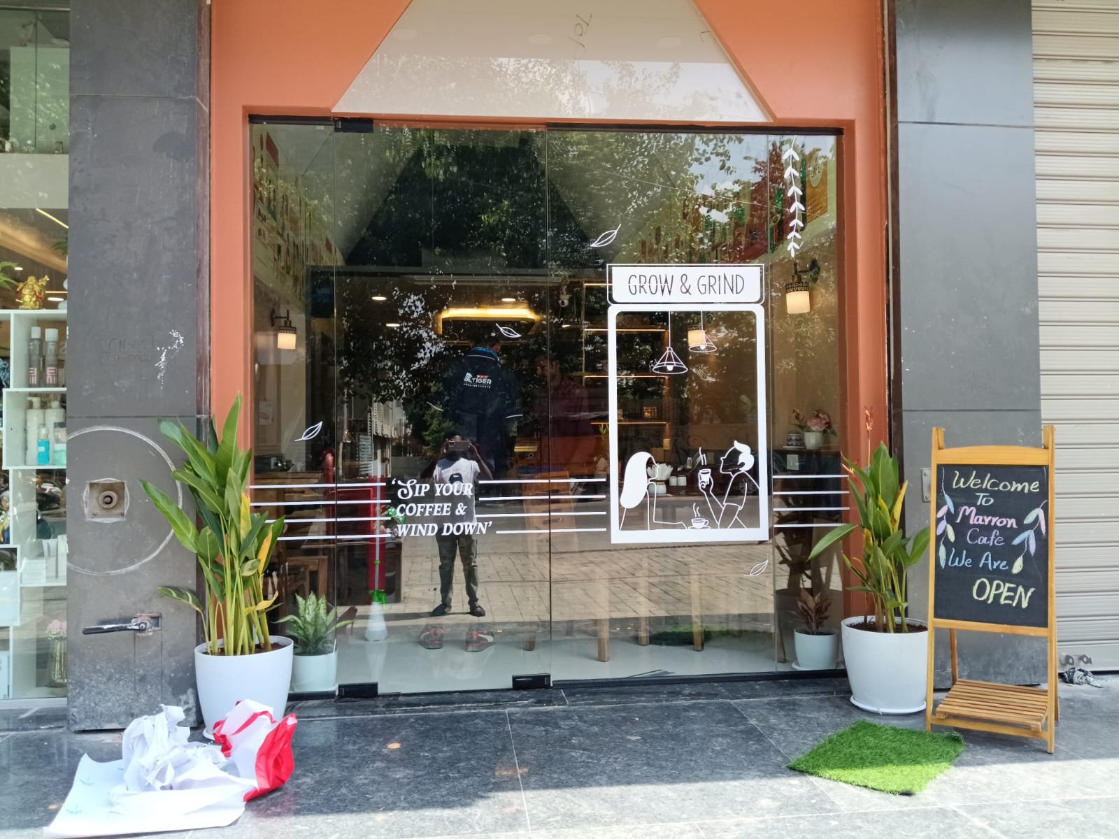 Cafe glass front decorated with white window graphics