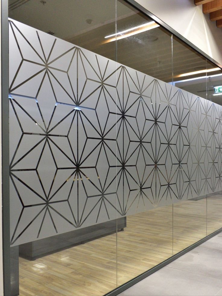 Geometric frosted film pattern on office glass