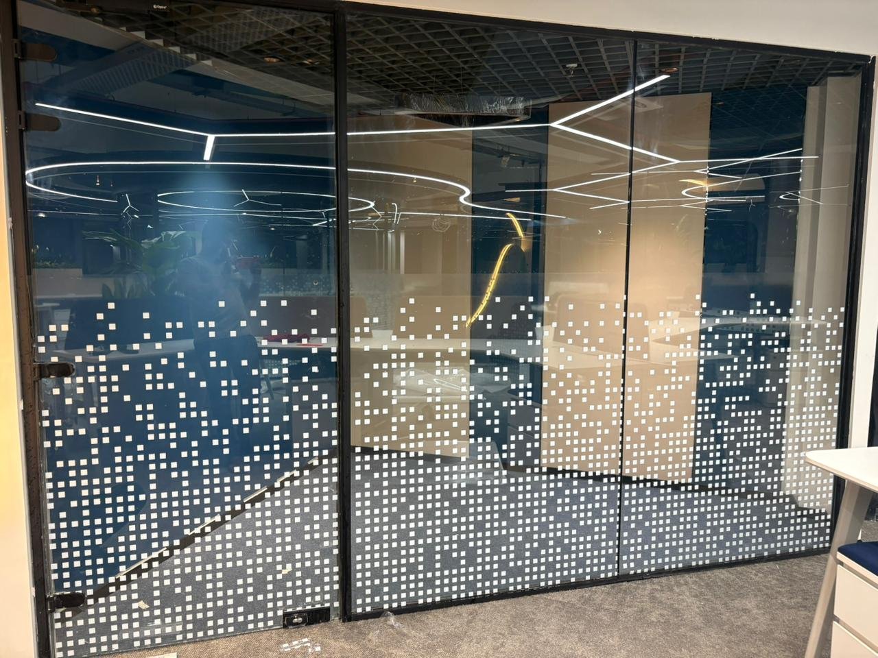 Glass partition with premium dotted privacy film